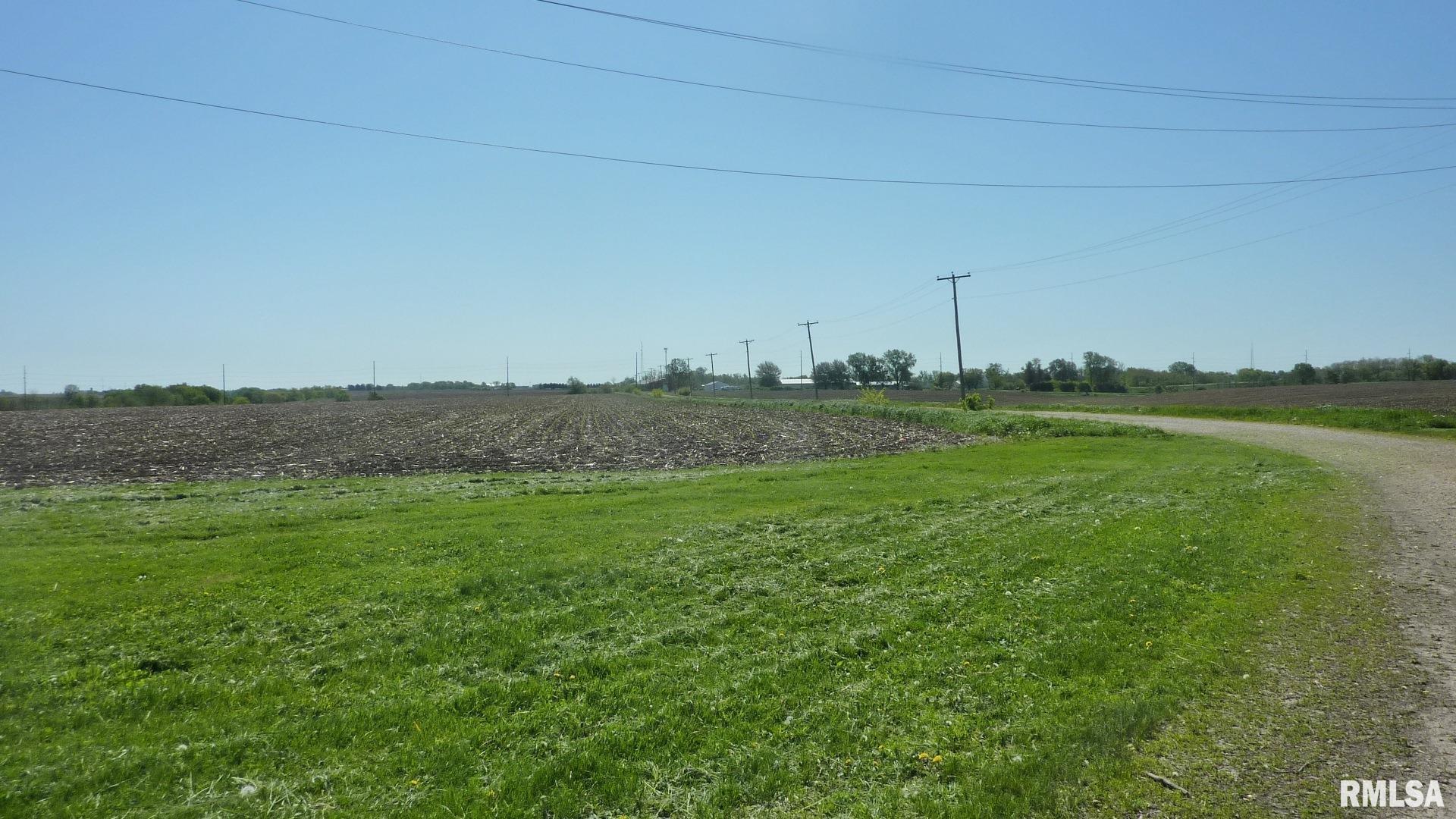 7936 Utica Ridge Road Davenport, IA 52807 - Photo 7 of 22 a view of a grassy field