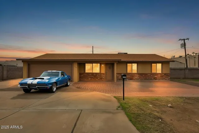 a car parked in front of a house