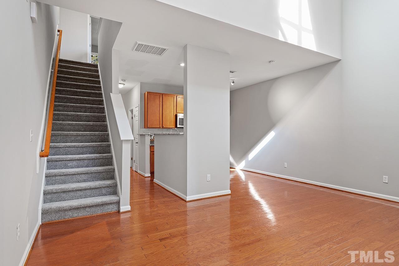 8516 Micollet Court Raleigh, NC 27613 - Photo 11 of 26 a view of entryway with wooden floor