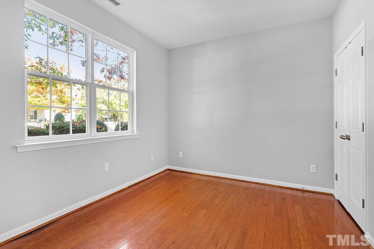 8516 Micollet Court Raleigh, NC 27613 - Photo 12 of 26 an empty room with a window