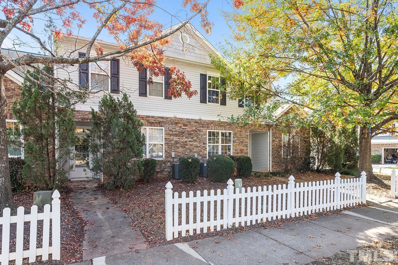 8516 Micollet Court Raleigh, NC 27613 - Photo 25 of 26 a front view of a house with a garden