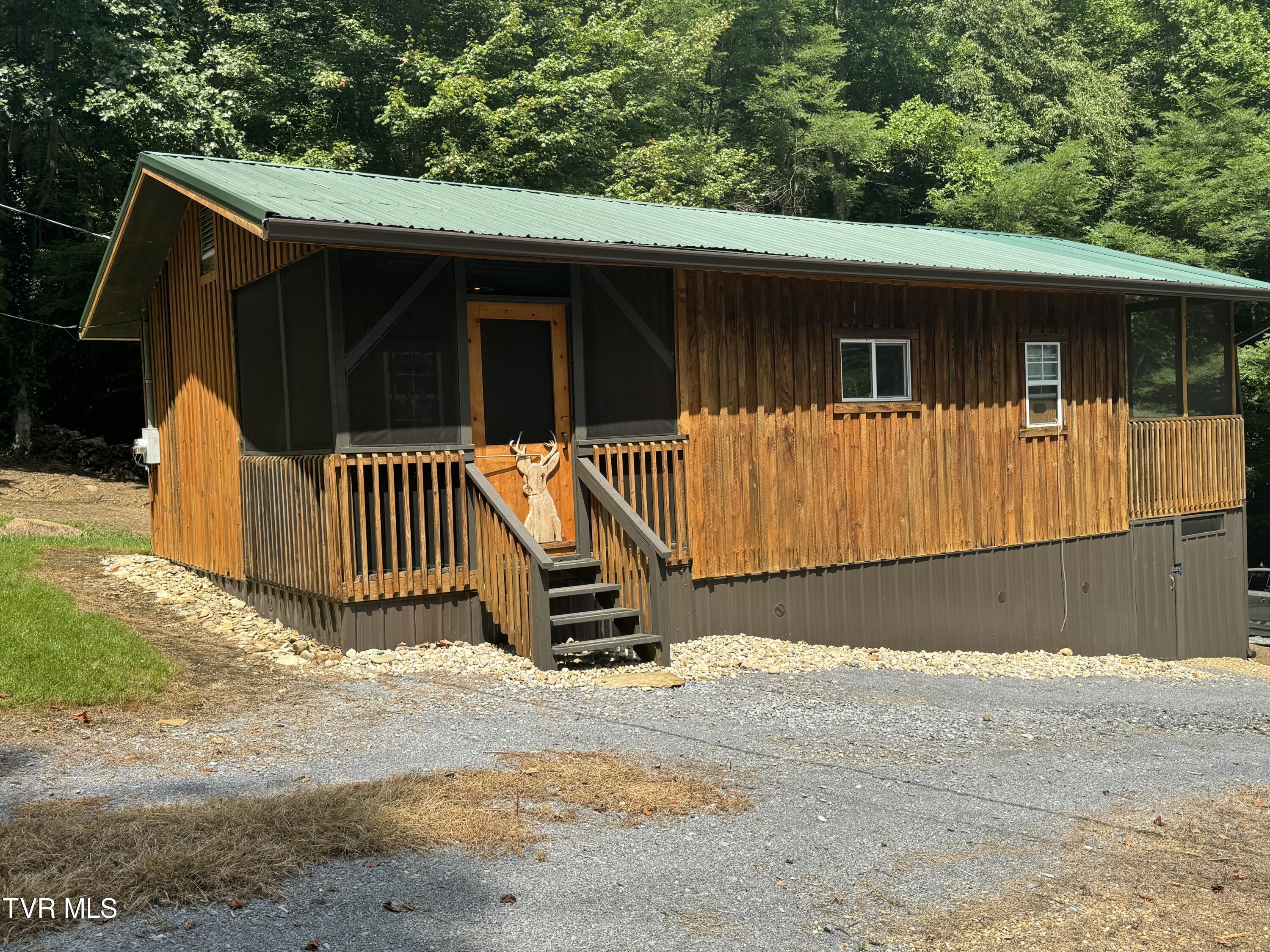 143 Doty Road Roan Mountain, TN 37687 - Photo 2 of 57 Photo Aug 22 2024, 12 33 30 PM
