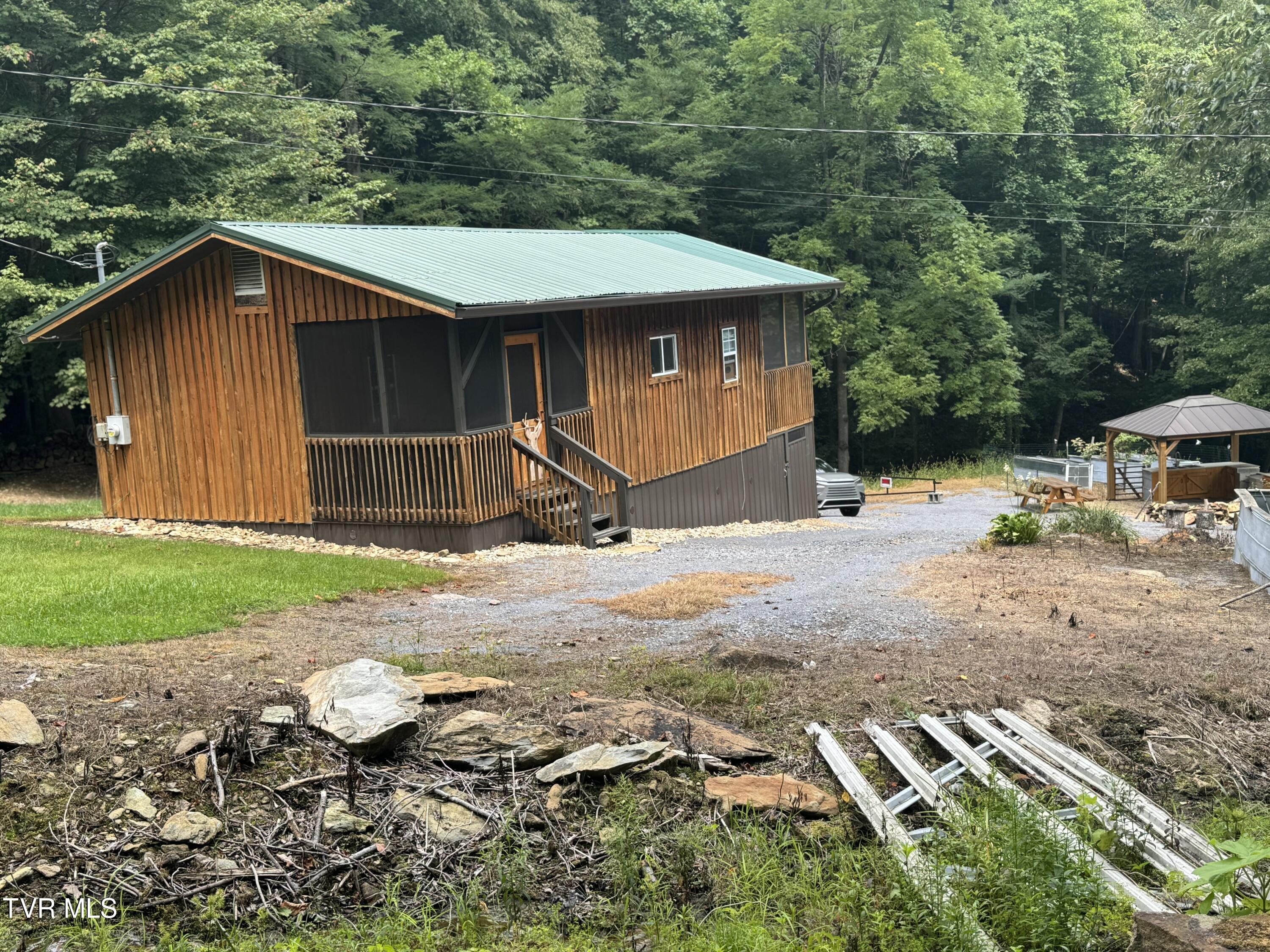 143 Doty Road Roan Mountain, TN 37687 - Photo 5 of 57 Photo Aug 22 2024, 12 34 30 PM