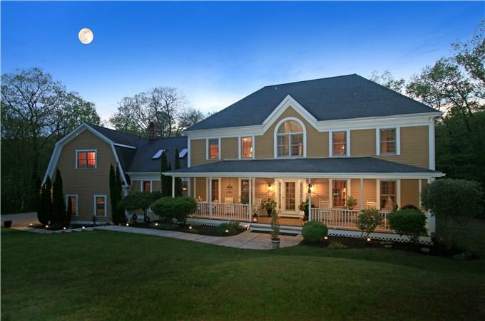 11 Stone Bridge Trail Newtown, CT 06482 - Photo 1 of 1 a front view of a house with a garden and lake view