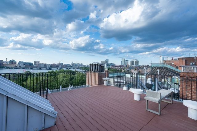 a view of a balcony with city view