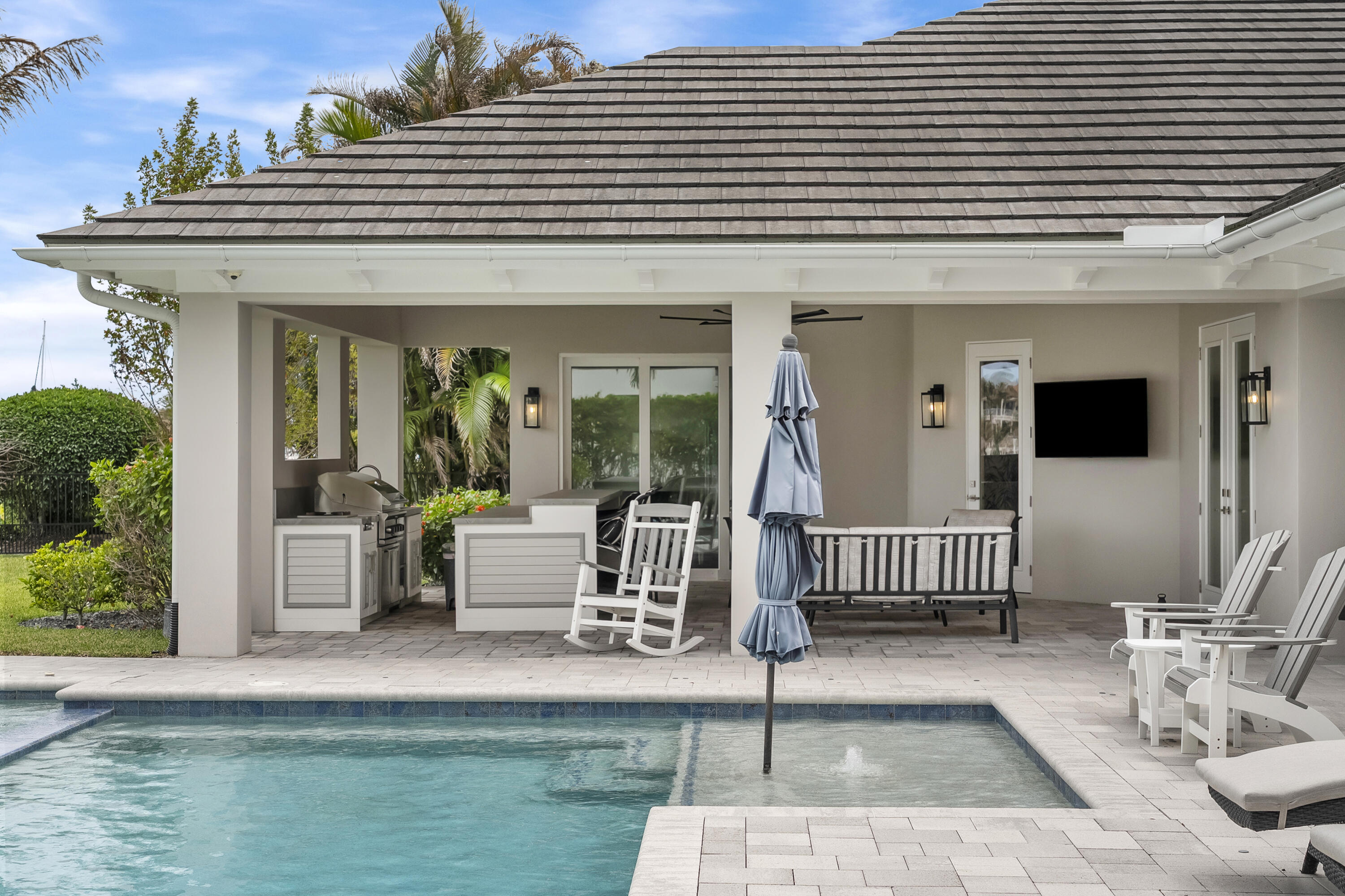 3973 Southeast Topsail Court Stuart, FL 34997 - Photo 35 of 38 a view of a patio with a chairs