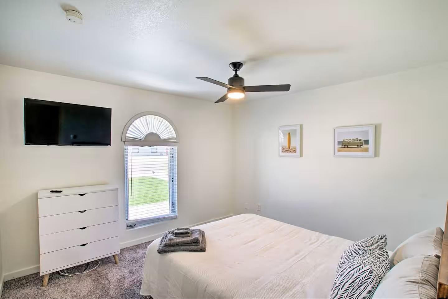 1233 East Marny Road Tempe, AZ 85288 - Photo 11 of 20 a bedroom with a bed and a flat screen tv