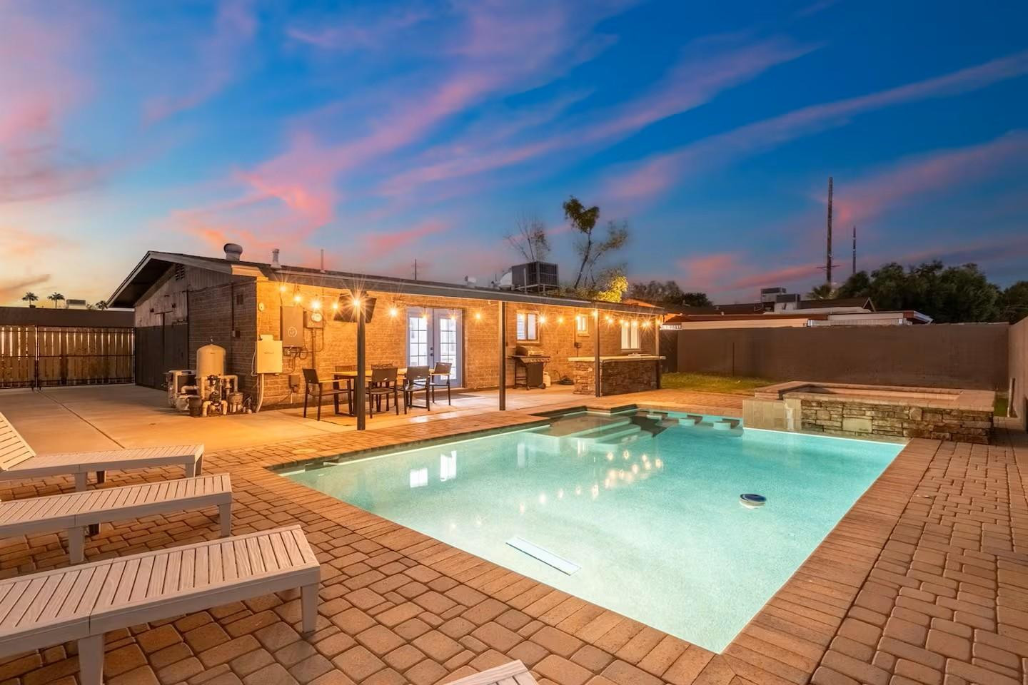 1233 East Marny Road Tempe, AZ 85288 - Photo 19 of 20 a view of a swimming pool with a lounge chairs