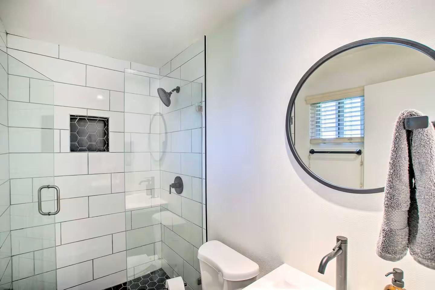 1233 East Marny Road Tempe, AZ 85288 - Photo 20 of 20 a bathroom with a sink mirror toilet and shower