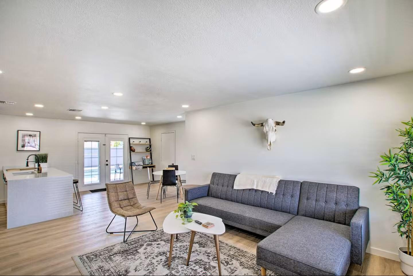 1233 East Marny Road Tempe, AZ 85288 - Photo 3 of 20 a living room with furniture and a wooden floor