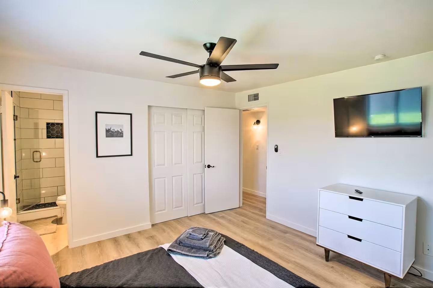 1233 East Marny Road Tempe, AZ 85288 - Photo 9 of 20 a bedroom with a bed and a flat screen tv