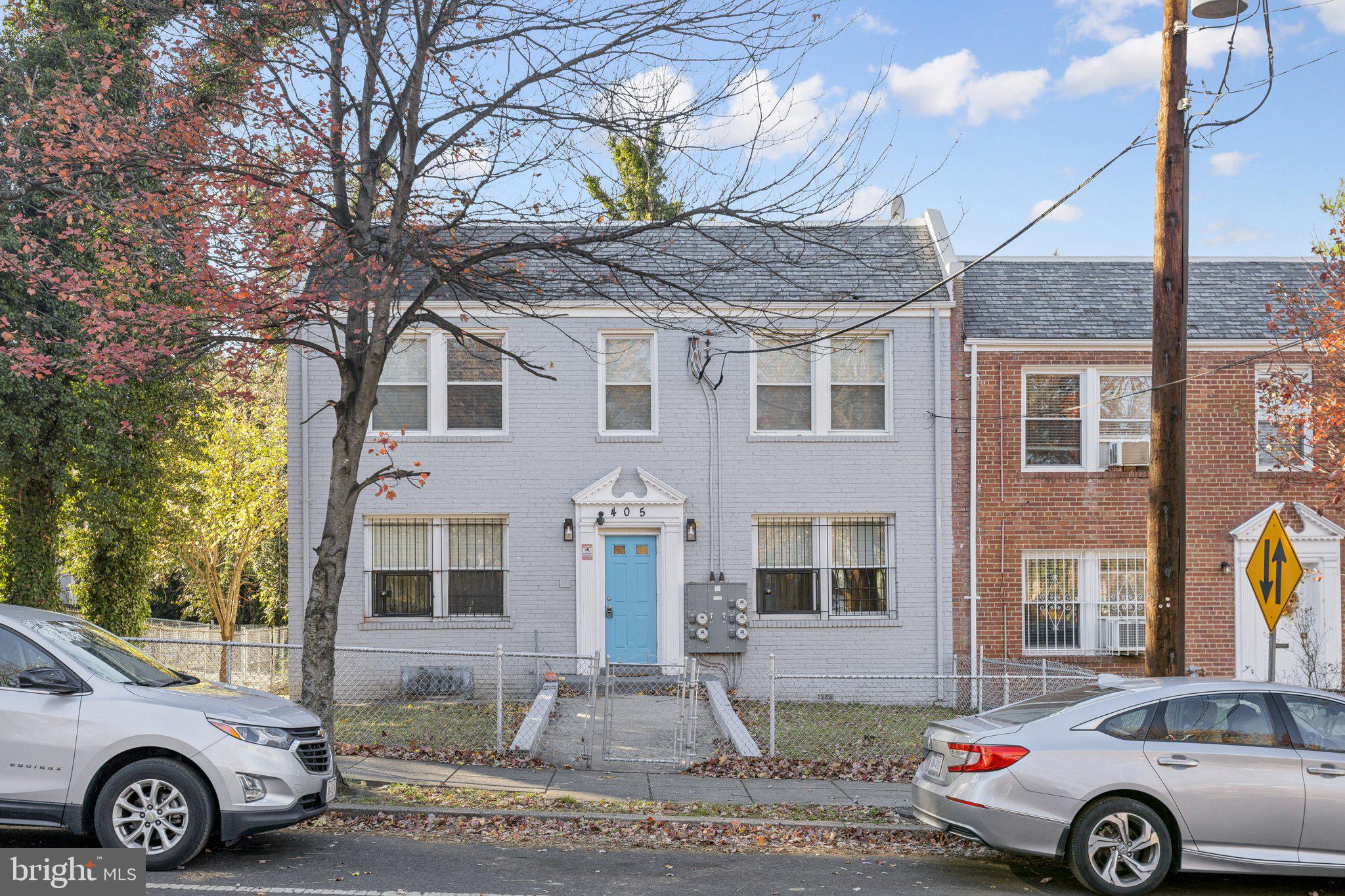 405 34th Street Southeast, Unit 2 Washington, DC 20019 - Photo 1 of 13 a front view of a house with parking space