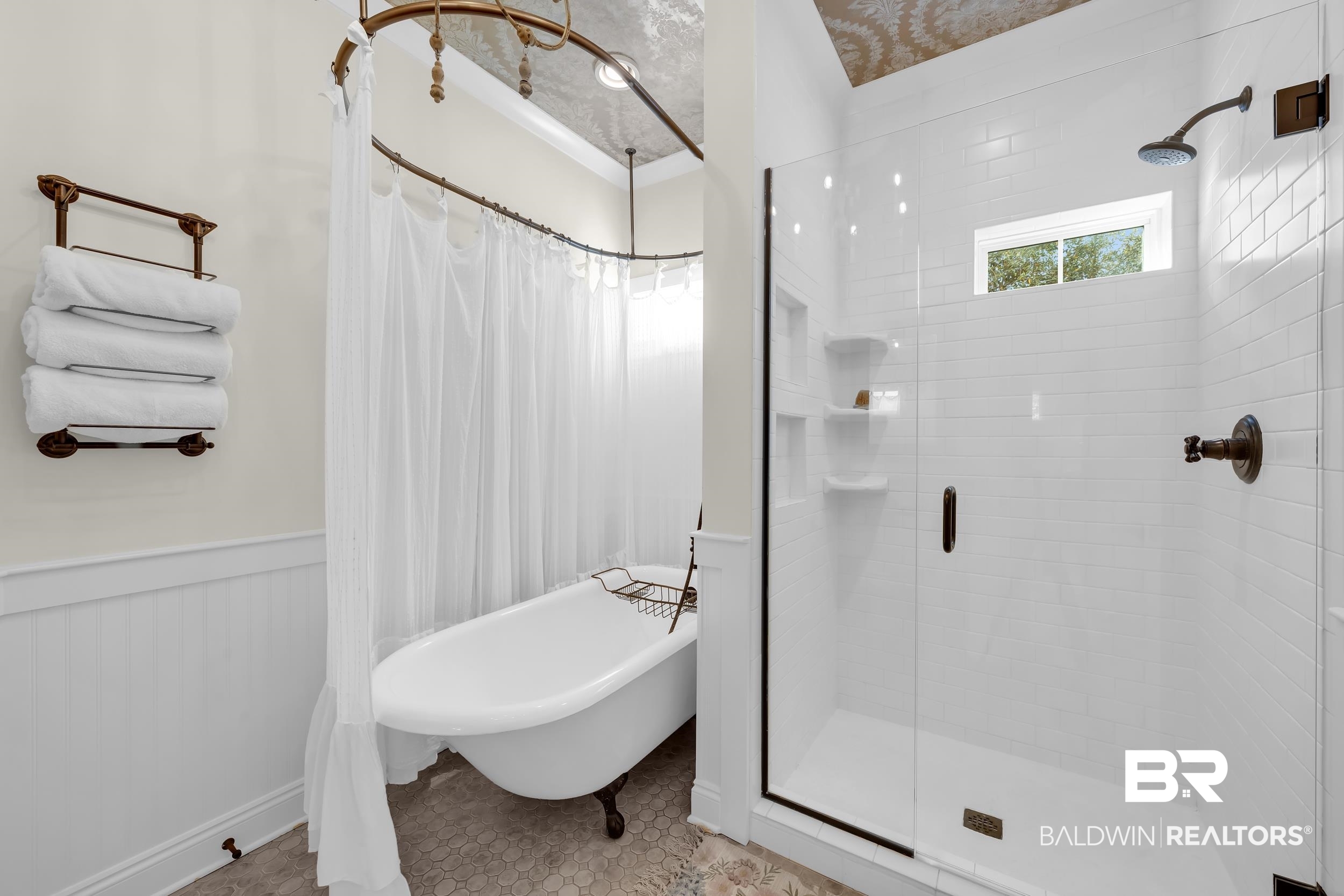 12161 Jessamine Street Magnolia Springs, AL 36555 - Photo 37 of 70 Bathroom with a stall shower, a wainscoted wall, a freestanding tub, and tile patterned flooring