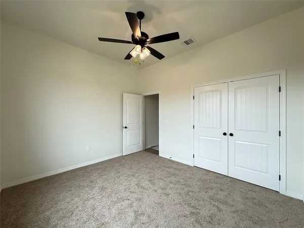 a view of a ceiling fan in a room