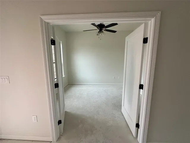 a view of a room with an empty space