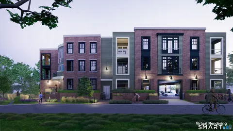 a view of a building with a yard