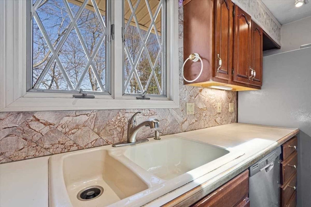 77 Zenith Drive Worcester, MA 01602 - Photo 18 of 40 a view of a sink and a window in a kitchen
