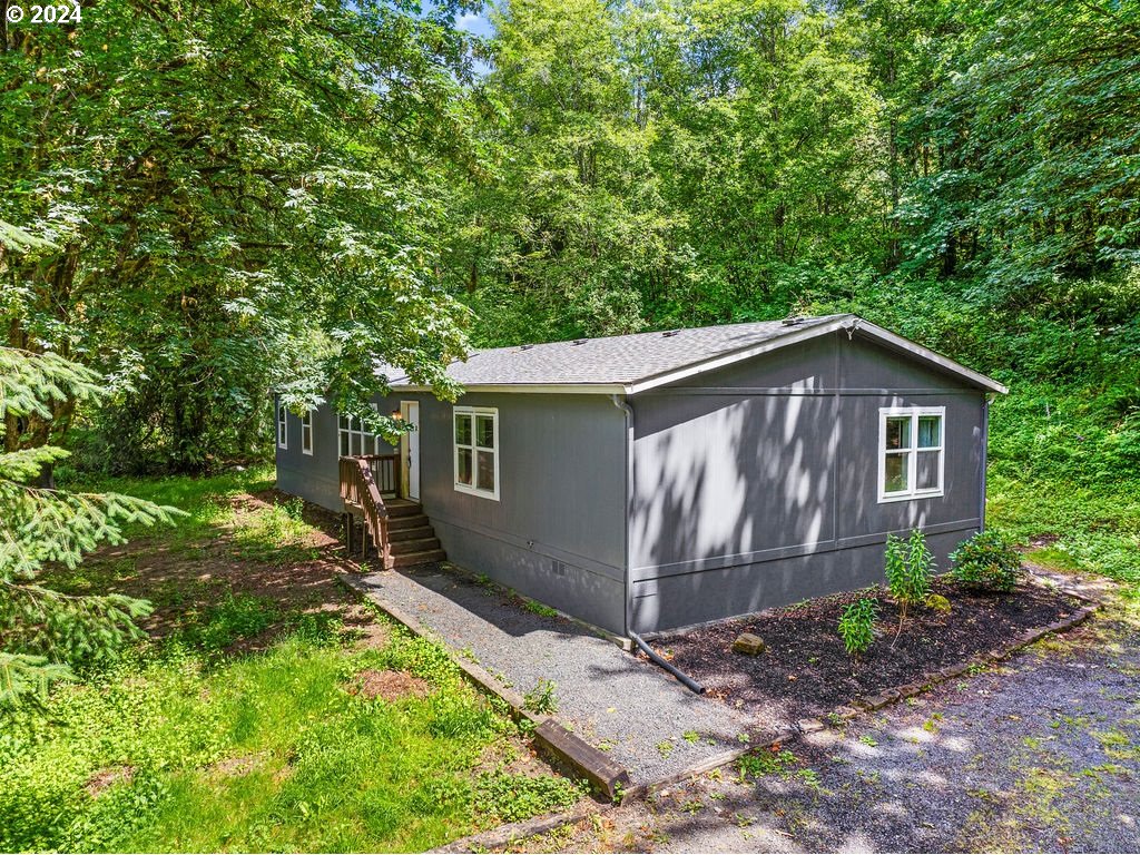 119 Ragland Road Longview, WA 98632 - Photo 1 of 30 a view of a house with a yard