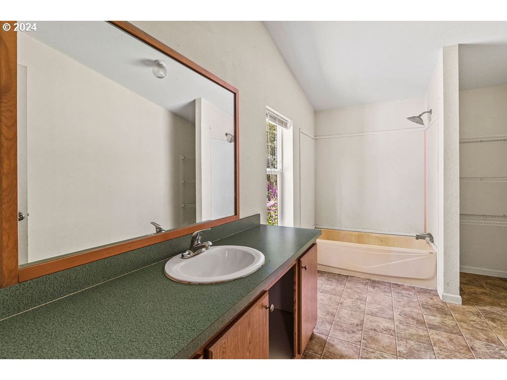 119 Ragland Road Longview, WA 98632 - Photo 17 of 30 a bathroom with a sink and a mirror