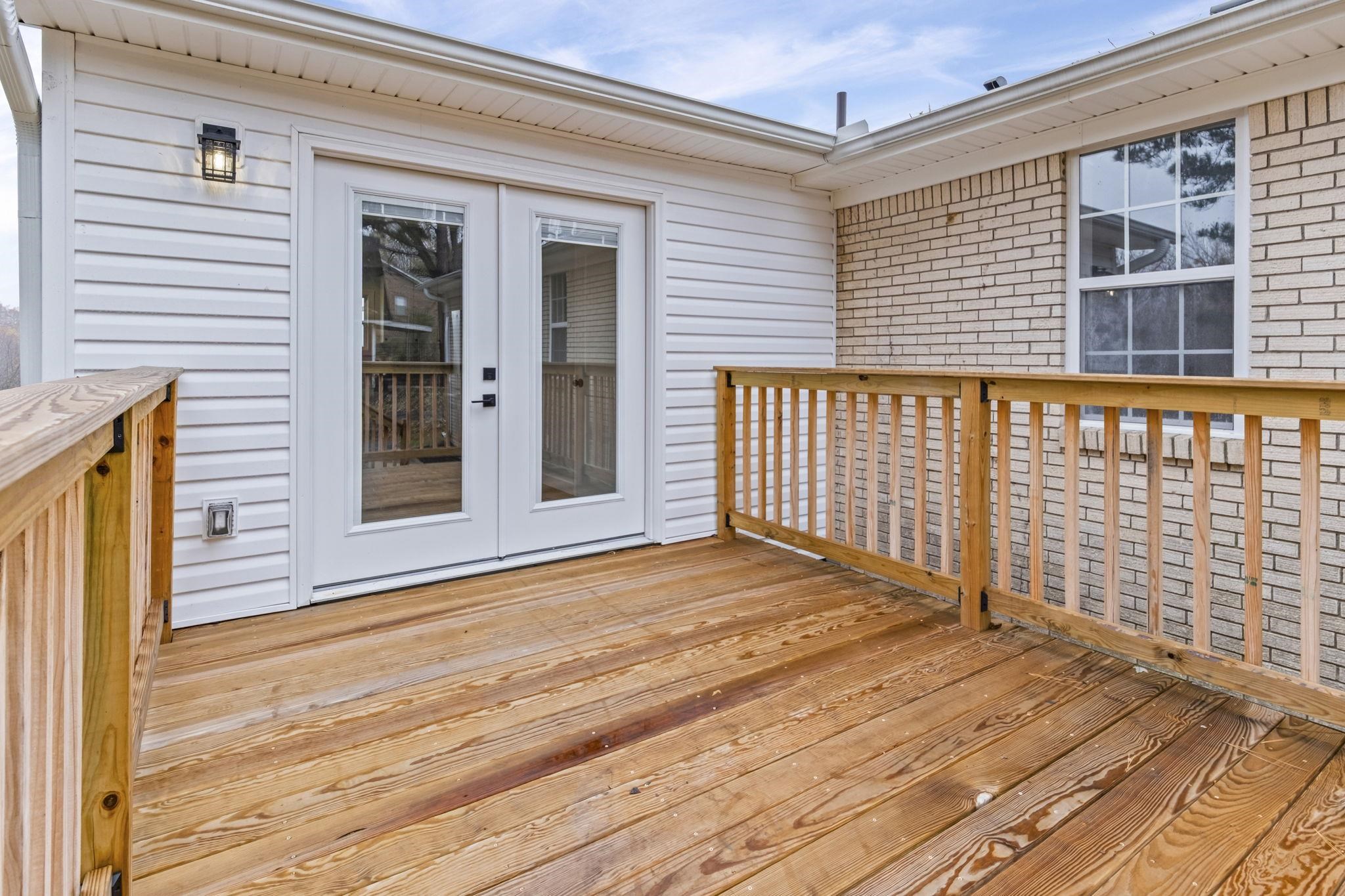 835 Curve Woodville Road Gates, TN 38037 - Photo 26 of 30 Wooden deck featuring french doors