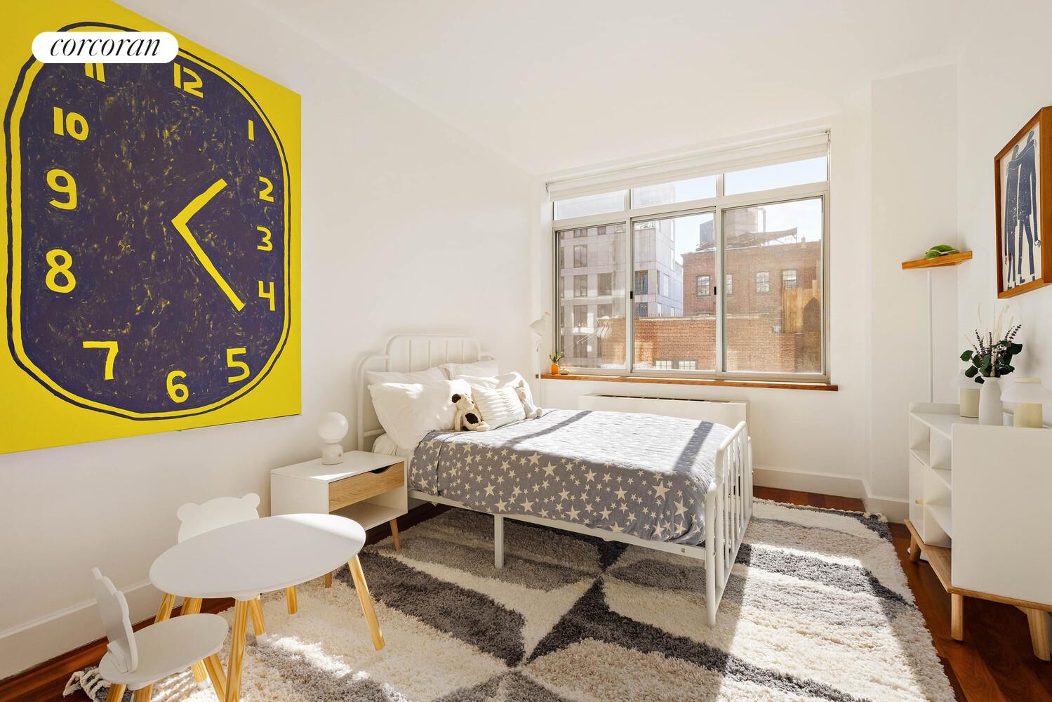 84 Front Street, Unit 7F Brooklyn, NY 11201 - Photo 9 of 12 a bedroom with a bed and a window