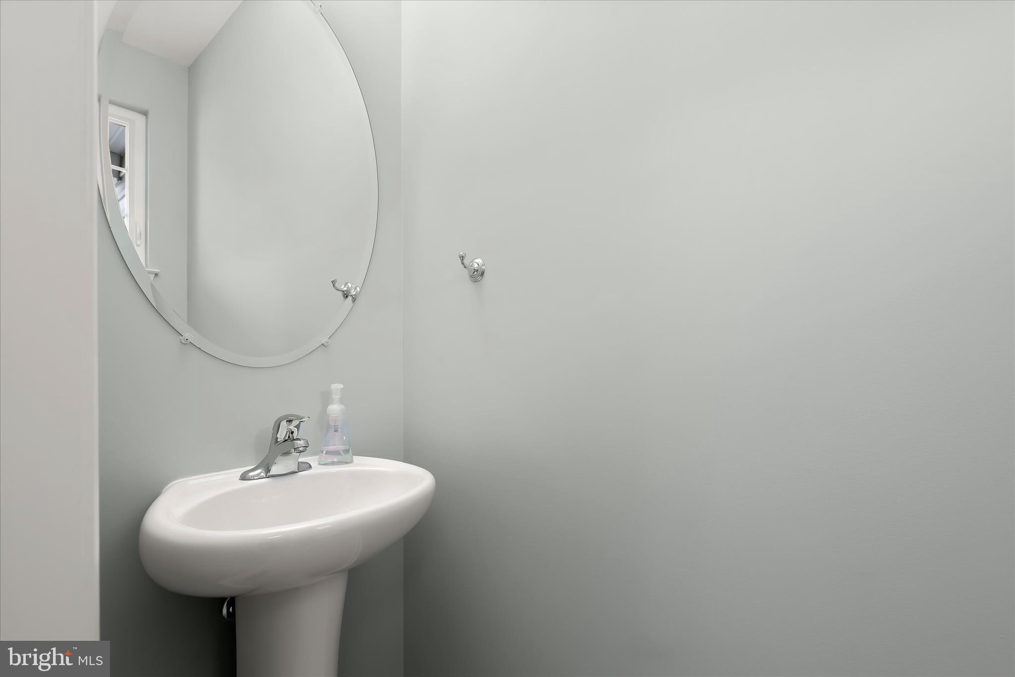 2845 Union Square Road, Unit 66 New Windsor, MD 21776 - Photo 28 of 44 Powder Room - Laundry Room - Garage Access