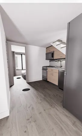 a kitchen with a stove and a refrigerator