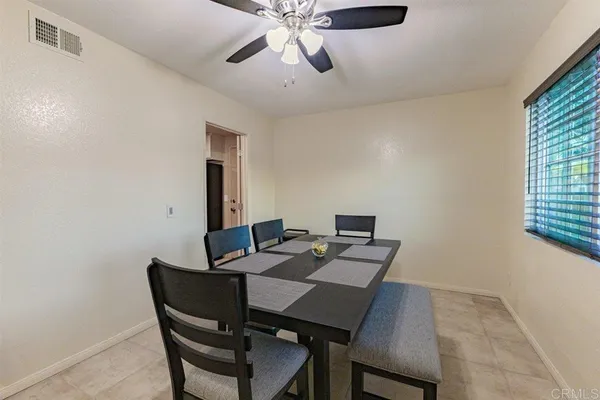 a view of a table and chairs in a room