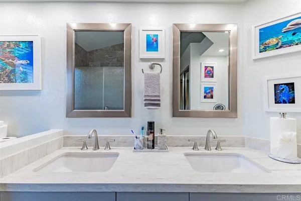 a bathroom with sink and a mirror