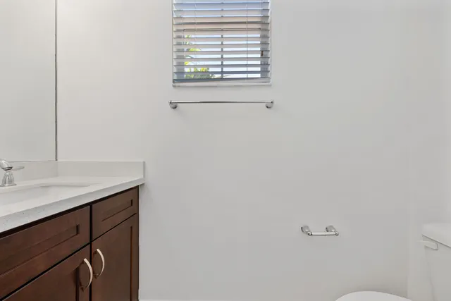 a bathroom with a sink and a toilet