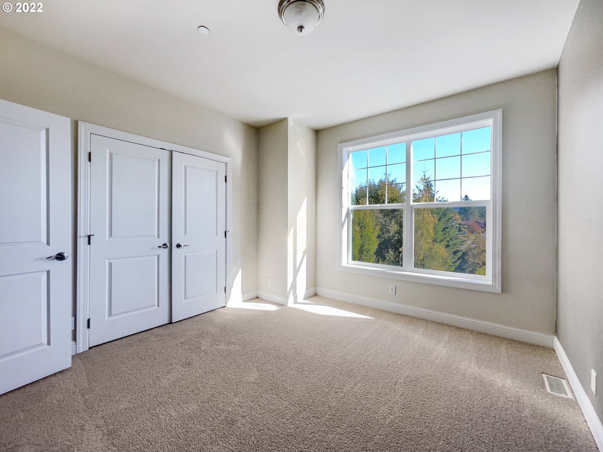 12111 Southeast High Creek Road Happy Valley, OR 97086 - Photo 12 of 14 a view of a livingroom with a window