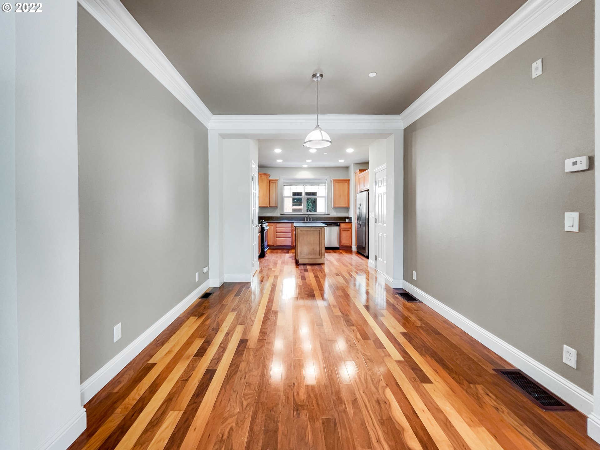12111 Southeast High Creek Road Happy Valley, OR 97086 - Photo 2 of 14 a view of a room with wooden floor and windows