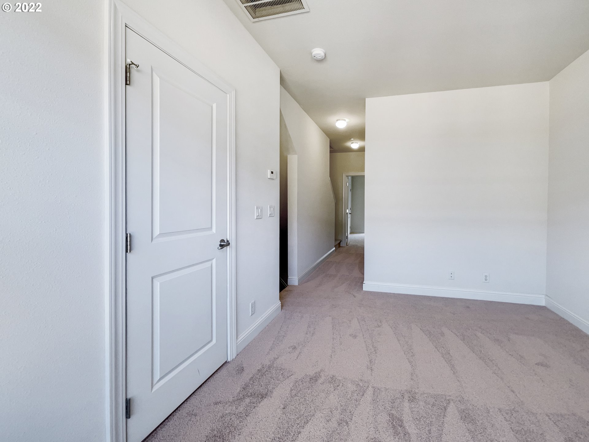 12111 Southeast High Creek Road Happy Valley, OR 97086 - Photo 6 of 14 a view of hallway with wooden floor