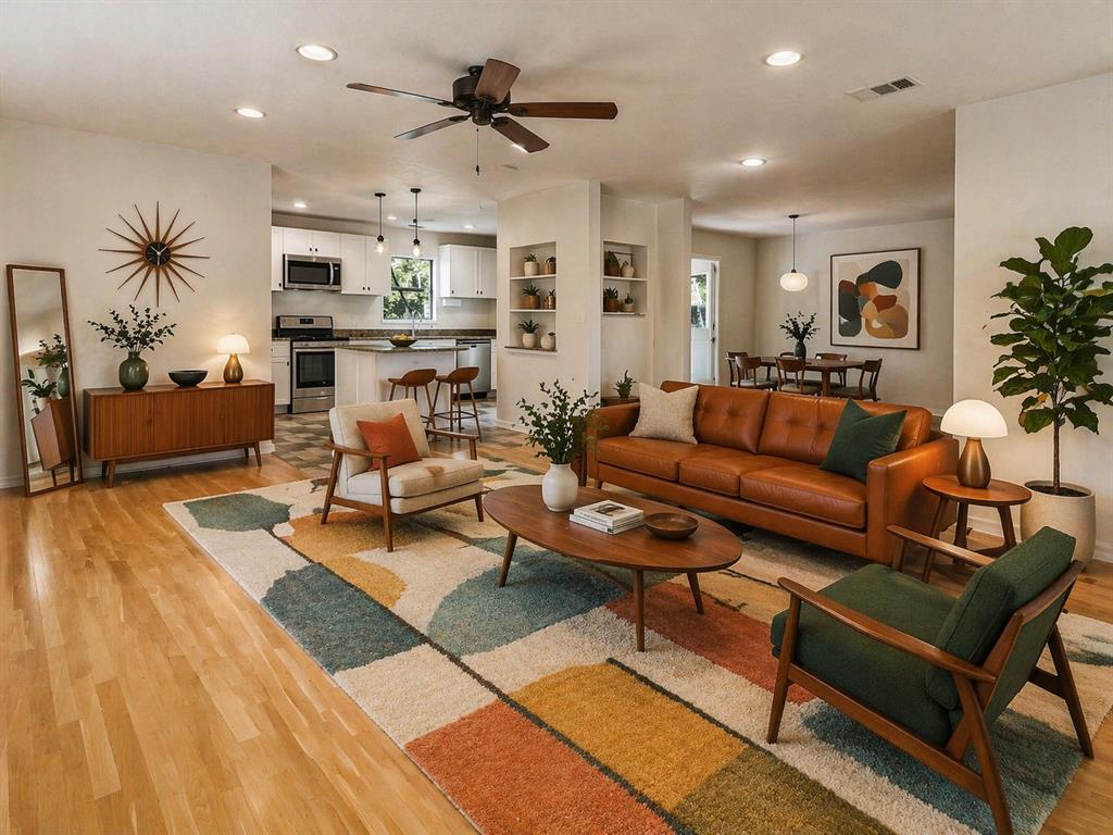 2315 Inadale Avenue Dallas, TX 75228 - Photo 5 of 36 a living room with furniture kitchen view and a wooden floor