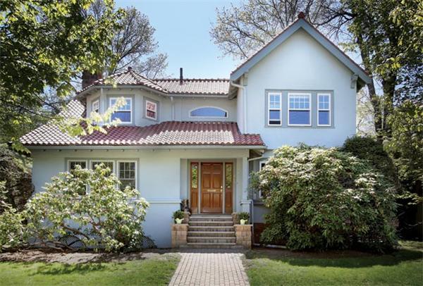 280 Clark Road Brookline, MA 02445 - Photo 1 of 13 a front view of a house with garden