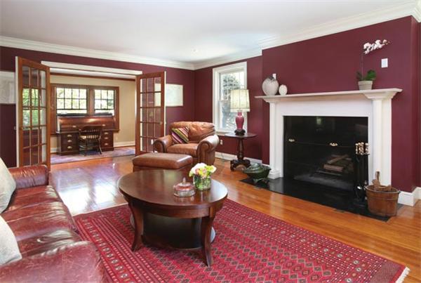 280 Clark Road Brookline, MA 02445 - Photo 3 of 13 a living room with furniture and a fireplace