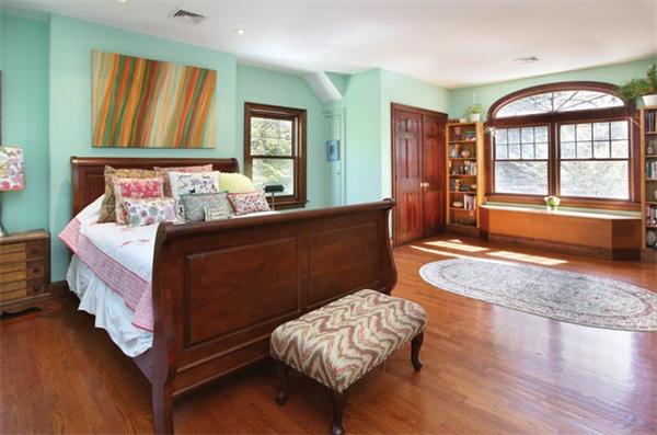 280 Clark Road Brookline, MA 02445 - Photo 9 of 13 a bed room with a bed and a couch
