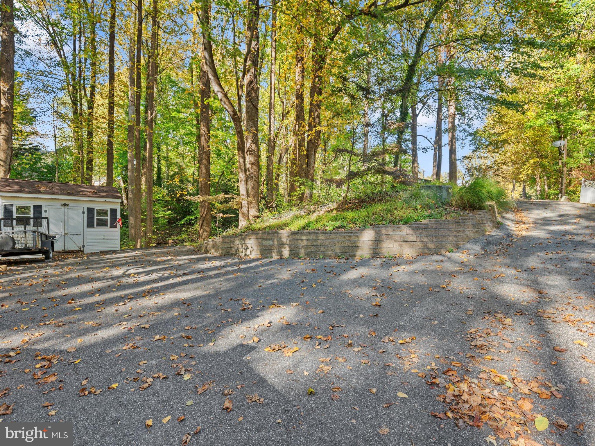 3671 Dory Brooks Road Chesapeake Beach, MD 20732 - Photo 4 of 36 a view of a house with a street