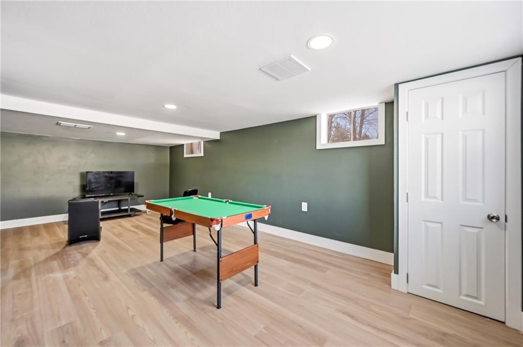 1480 George Street Hermitage, PA 16148 - Photo 13 of 40 a room with furniture and a wooden floor