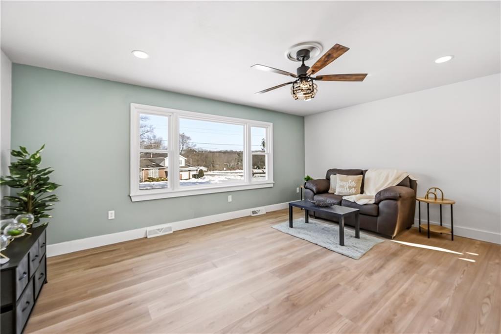 1480 George Street Hermitage, PA 16148 - Photo 6 of 40 a living room with furniture and a window