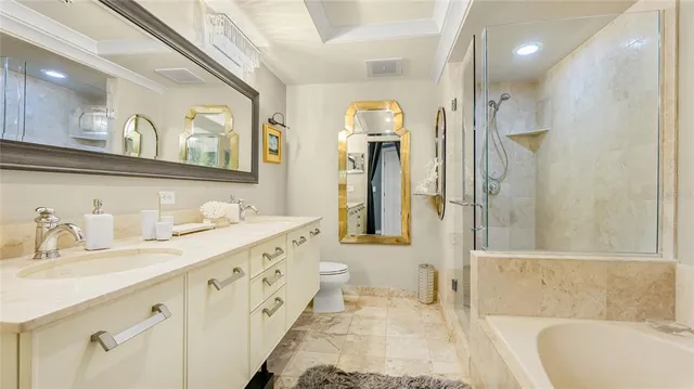 a bathroom with a tub sink and a mirror
