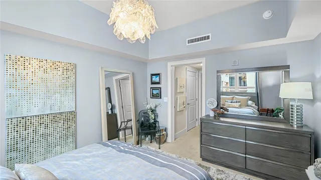 a bathroom with a double vanity sink toilet and shower