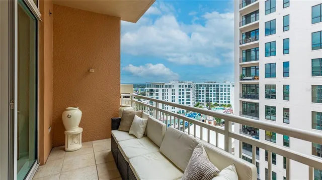 a view of a workspace room with furniture and book shelf