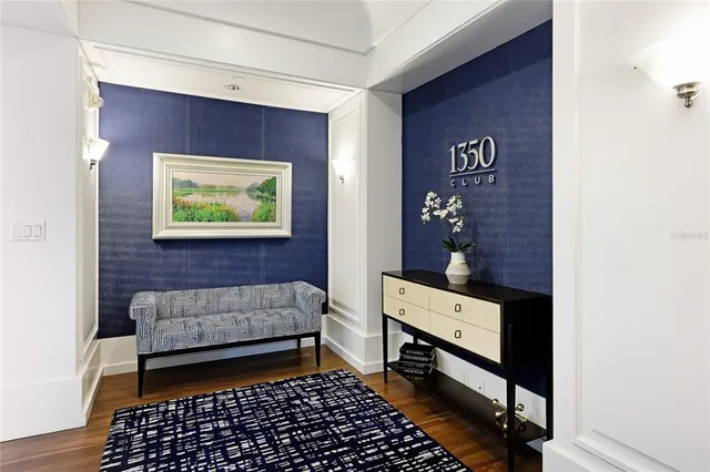 a view of a swimming pool with outdoor seating