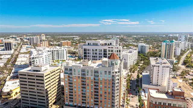 a view of city with ocean