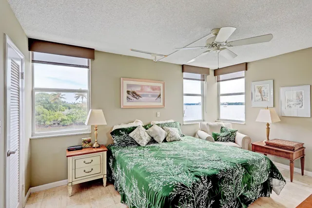 a bed room with furniture and a window