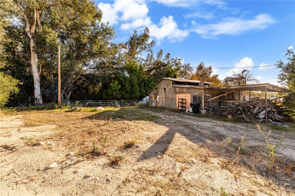 2700 Mill Creek Road Mentone, CA 92359 - Photo 13 of 22 a front view of a house with a yard