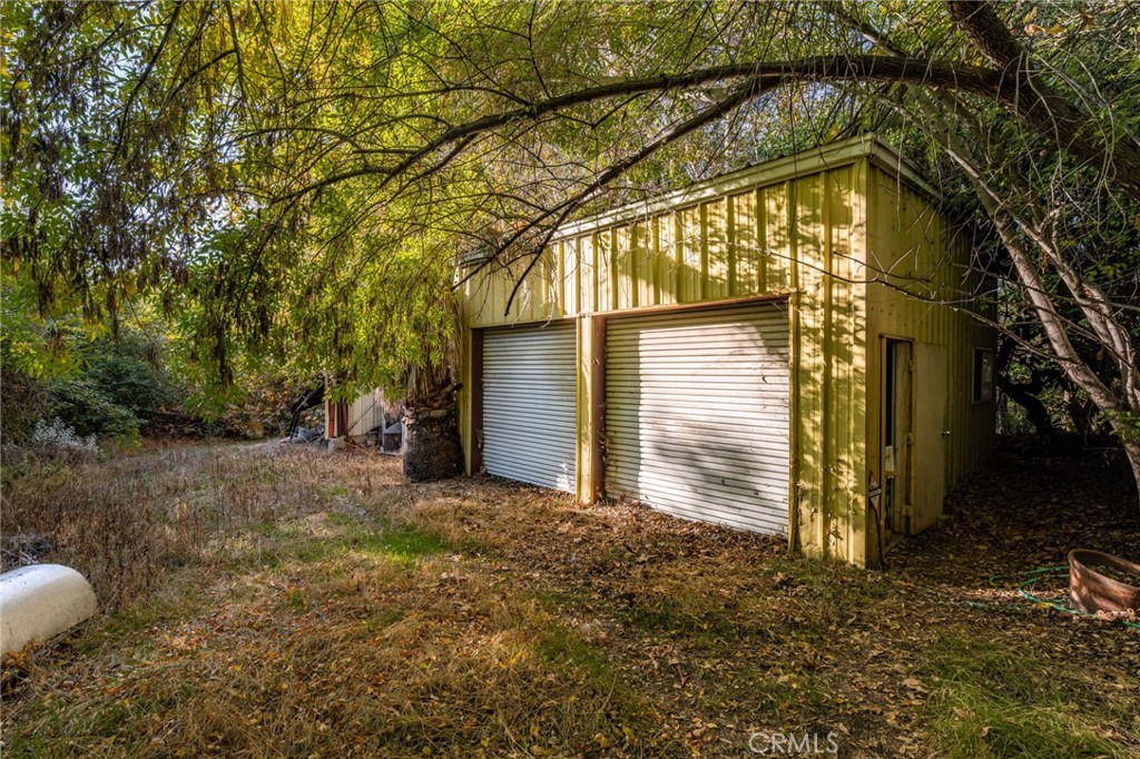 2700 Mill Creek Road Mentone, CA 92359 - Photo 17 of 22 a view of a house with backyard