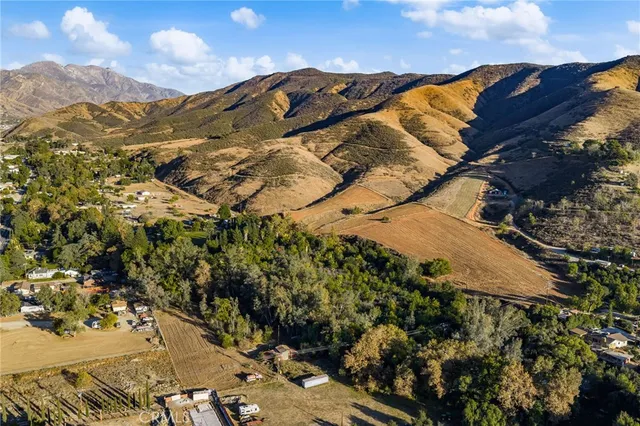 a view of a house with a mountain