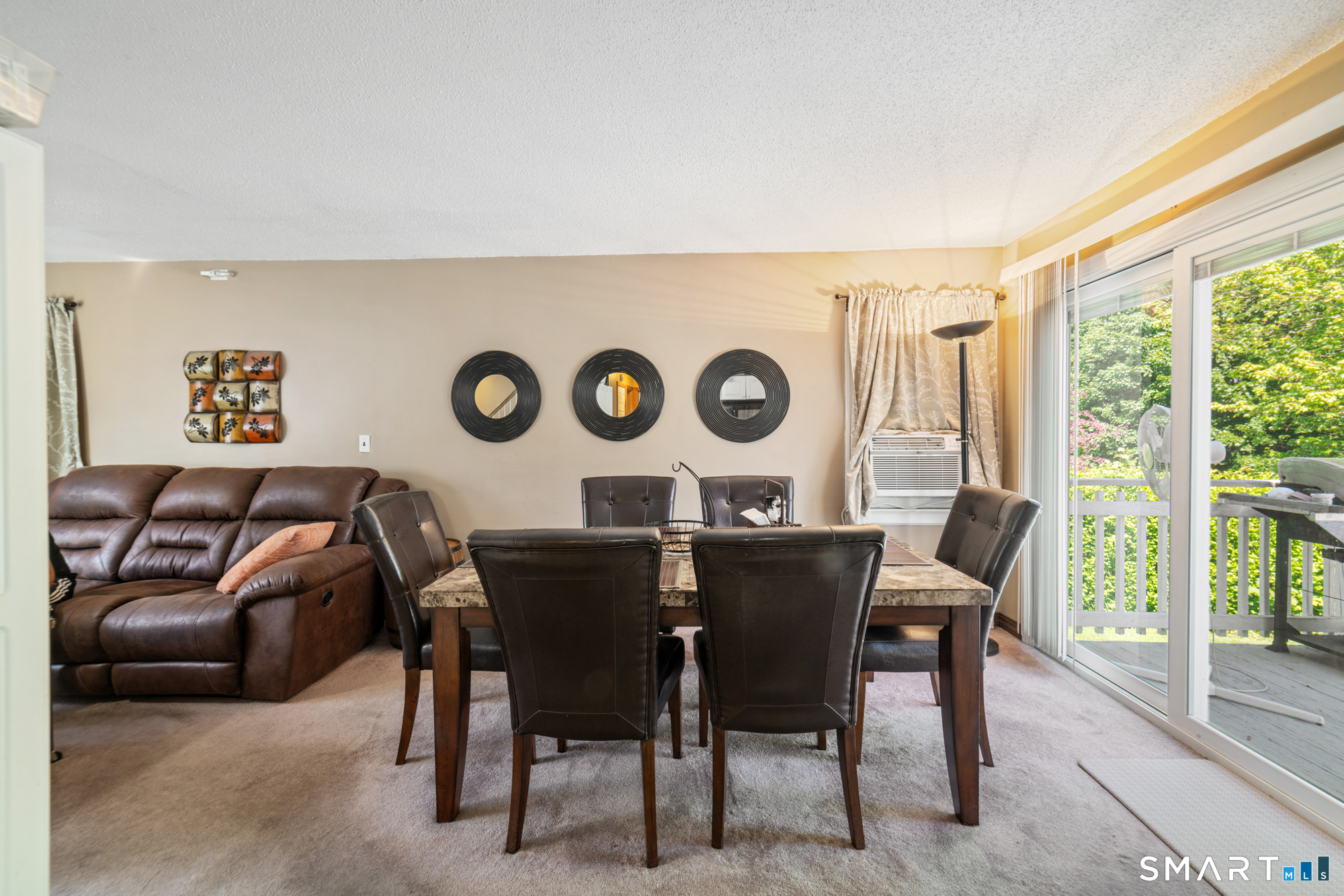 146 Highland Drive Waterbury, CT 06708 - Photo 9 of 31 a view of a dining room with furniture window and outside view